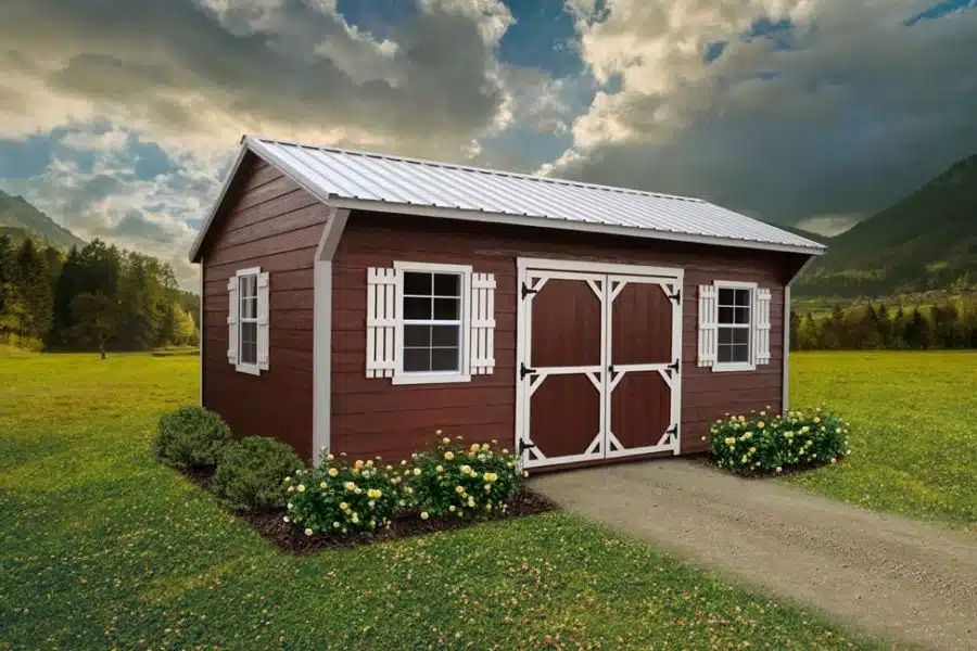 Red Quaker shed with white trim, shutters and double doors delivered in Elizabethton TN