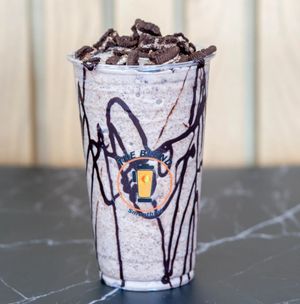 Cookie Blitz smoothie made with 2% milk, Oreo cookies, frozen yogurt, chocolate sauce, and chocolate drizzle.