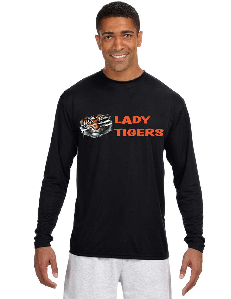 Black long-sleeve performance shirt with a custom Lady Tigers graphic and team name printed on the front.