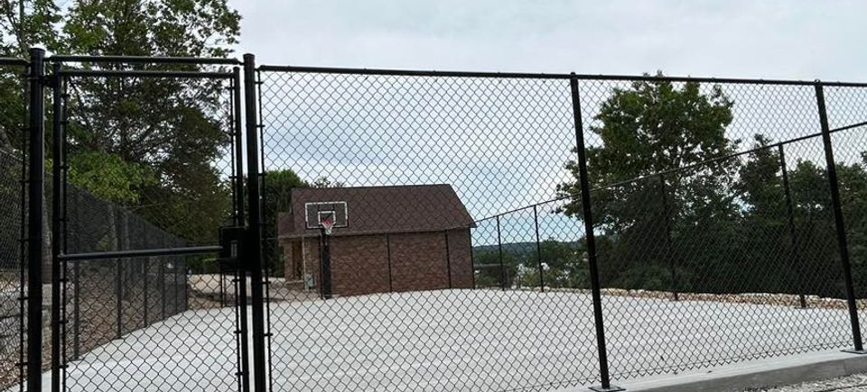 Galvanized chain link fence basketball court