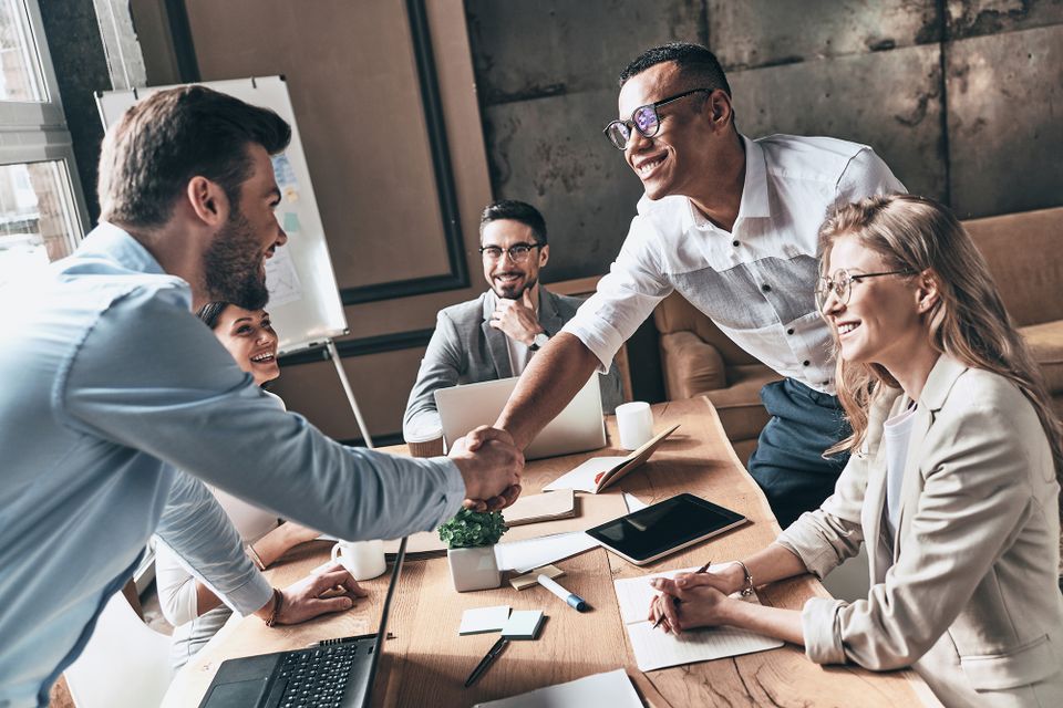 Business team meeting with a client