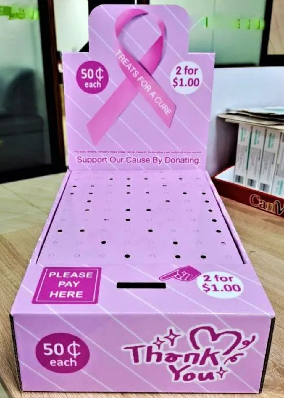Pink Ribbon box display, fits nicely on the countertop. Filled with candy. Easy to operate side gig vending route.