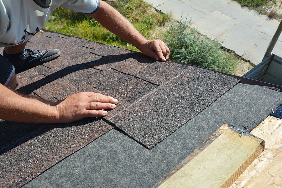 Bigstock roofer installing asphalt shin 265203760 original