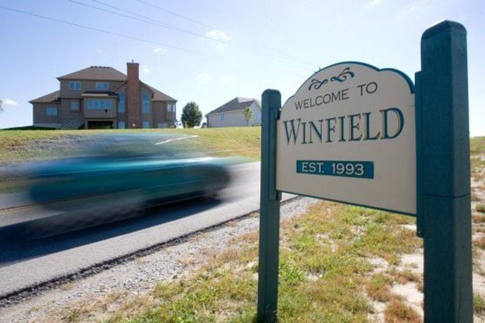 Sign with blurred car