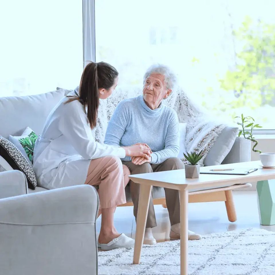 Elderly talking to hospice