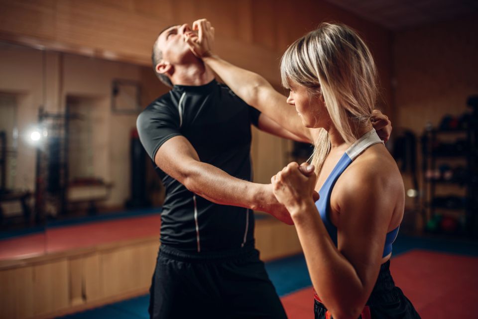 A woman practicing self defense