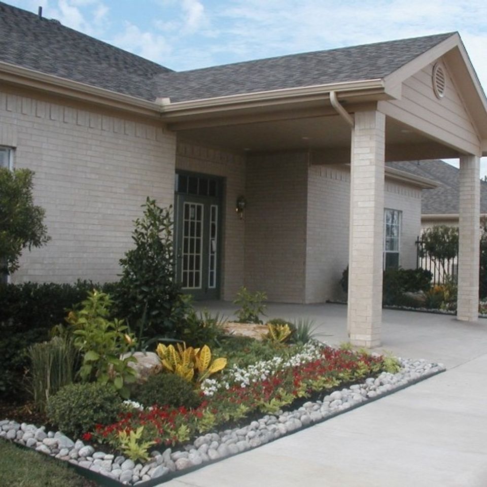 Front of clubhouse   flowerbed20130818 20083 xk91q9 0