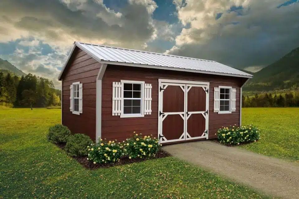 Red Quaker shed with white trim, shutters and double doors delivered in Elizabethton TN