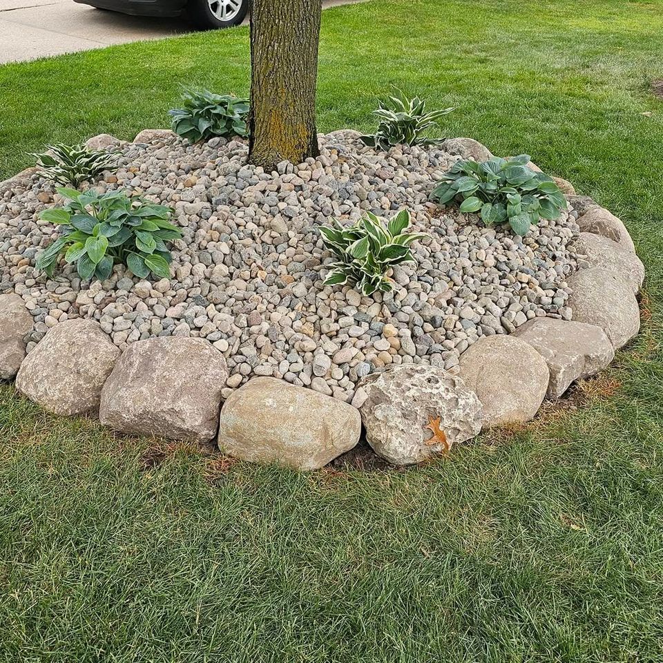Rock and plant work done by Vic's Landscaping