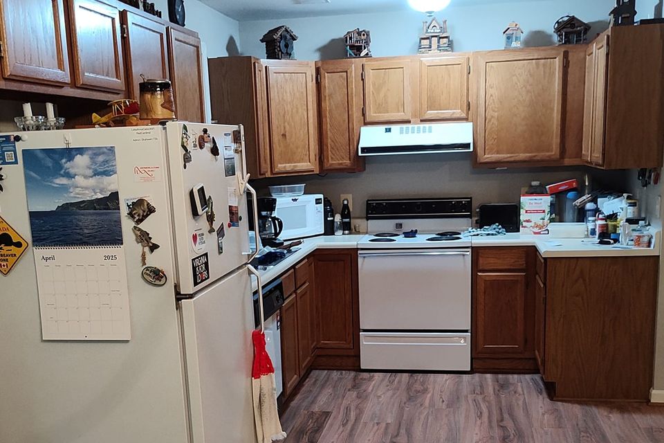 Finished kitchen re face  installing floating floor with base shoe in kitchen tj 2