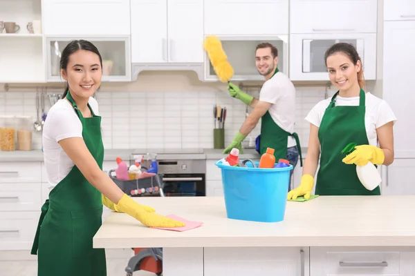 Depositphotos 153739442 stock photo cleaning service team at work