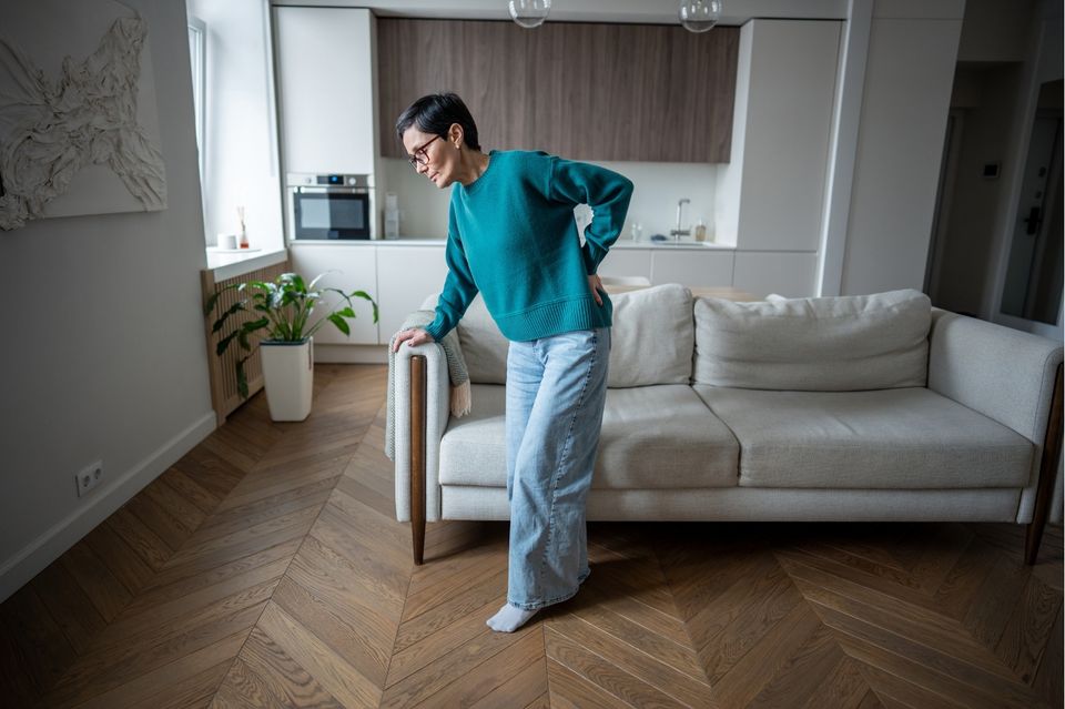 Person experiencing pain and limited mobility