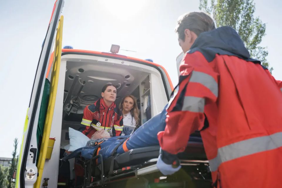 Vistacreate 414211148 stock photo selective focus paramedics carrying stretcher elderly man ambulance car doctor