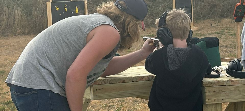 Dad and boy bb gun
