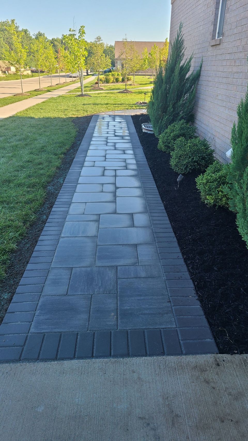 Beautiful patio walk way done by Vic's Landscaping