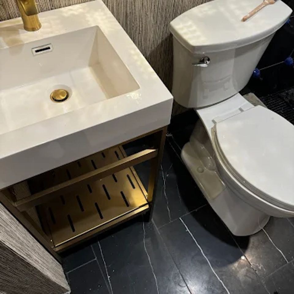 SInk and toilet installation, done by Taurus Contracting of Suffolk County, NY