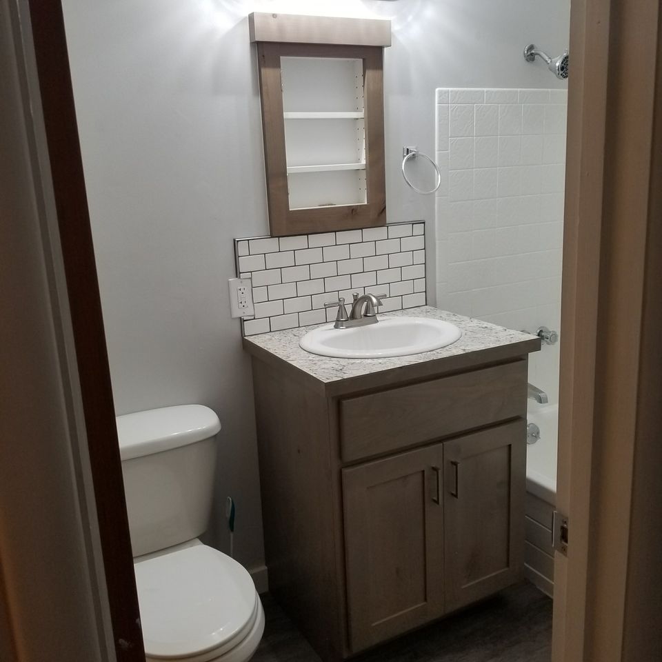 Bathroom with new sink and lights | Keeley Builders | Boise Idaho
