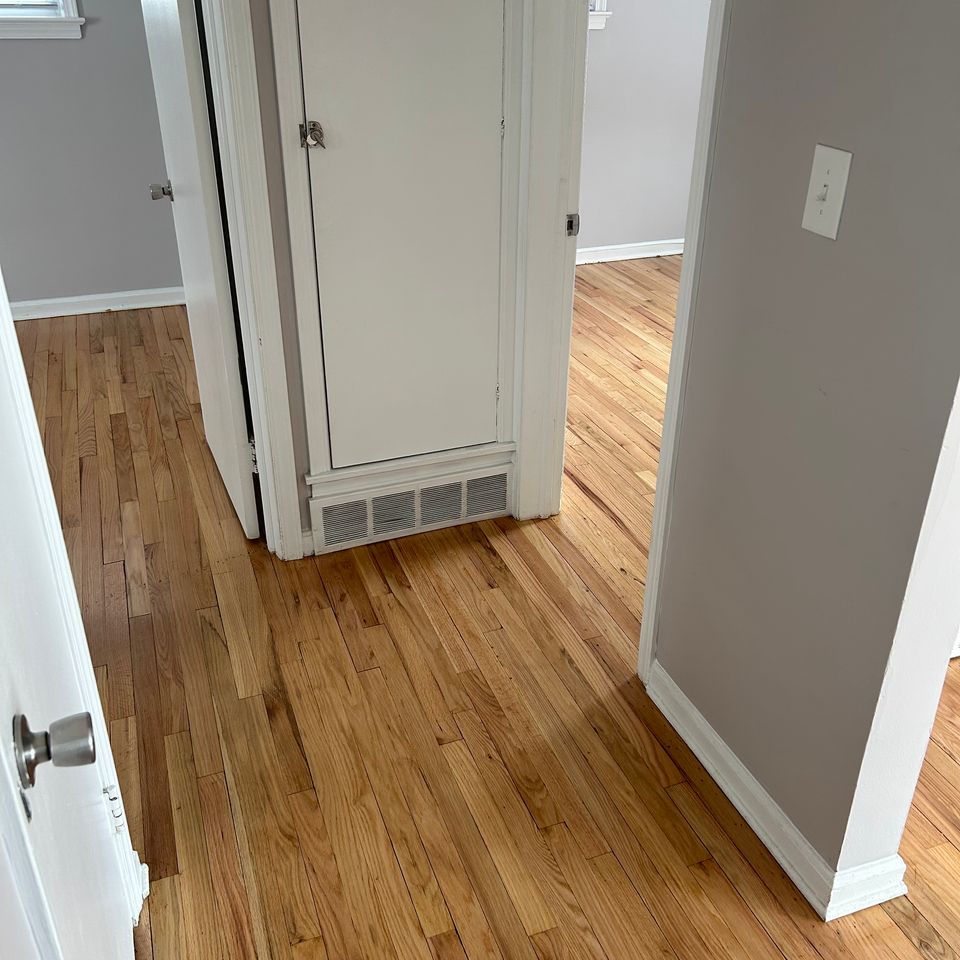 Hardwood flooring job, showing multiple rooms with the finished work, done by Siti Floors of Northeast Ohio