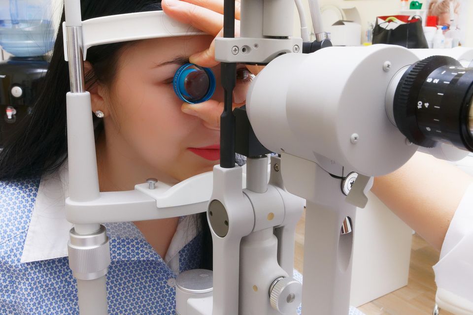 Women getting her annual eye check done at a family eye-care center