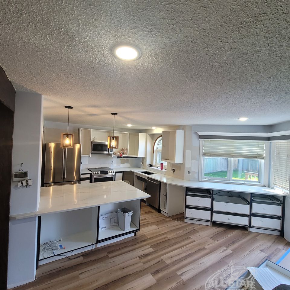 Custom kitchen countertops and island installation in Houston, TX