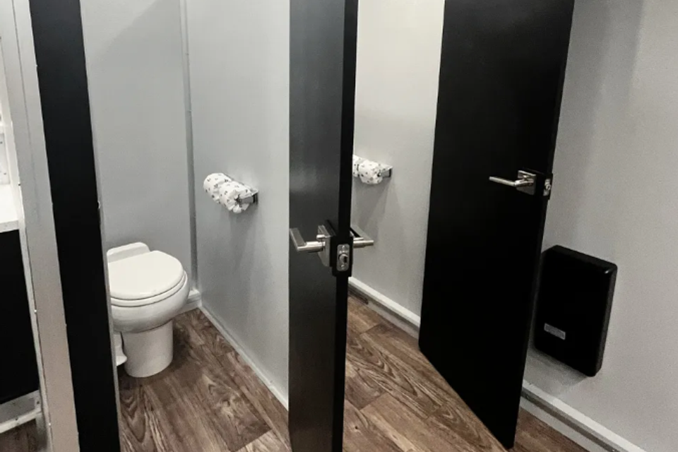 Multi-stall luxury restroom trailer for data center construction crews in Colorado City, Texas