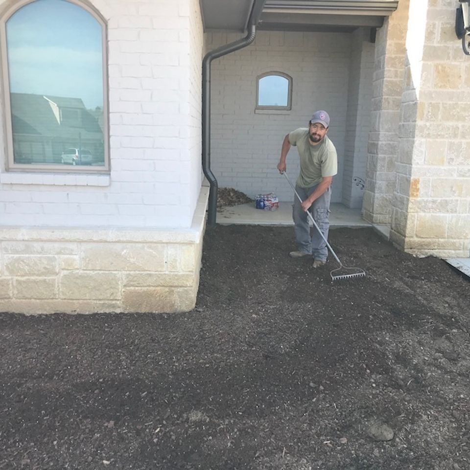 Landscaping solutions   tulsa oklahoma   hector working hard on a new flowerbed   image5