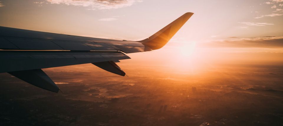 Cheap flights tips airplane wing view