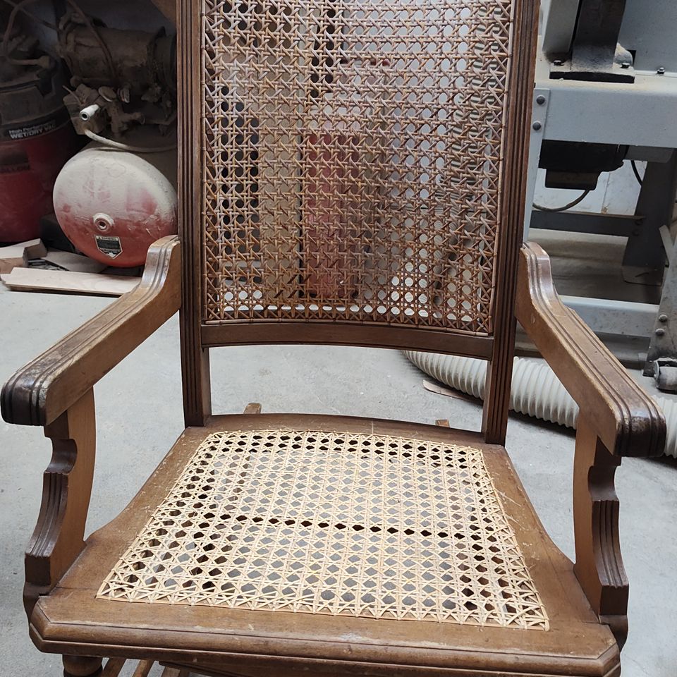 Finished hand woven rocking chair