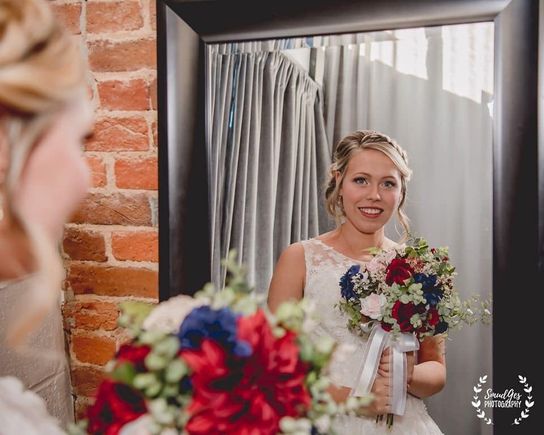 bride with bouquet at the coleman vault