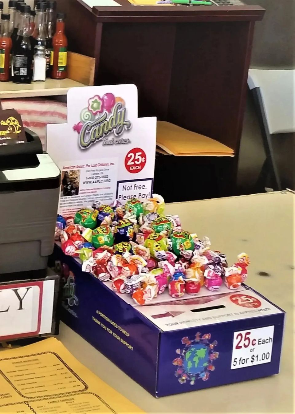 On display, fits nicely on the countertop. Filled with candy. Easy to operate side gig vending route.