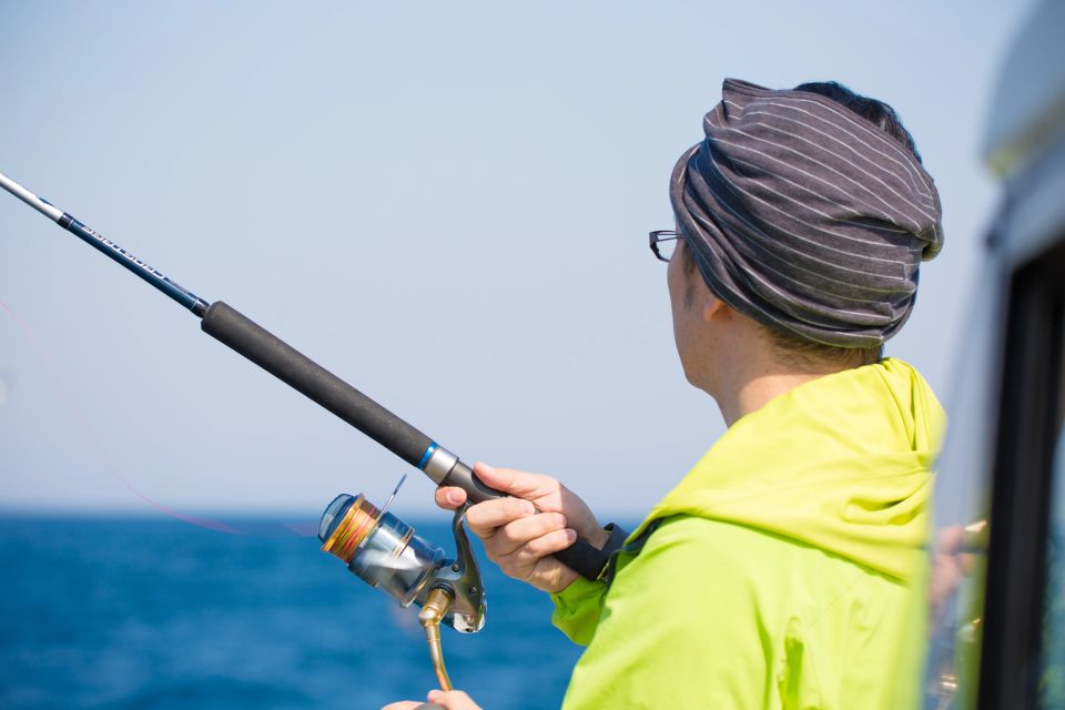 A man enjoying his time on a deep sea fishing charter