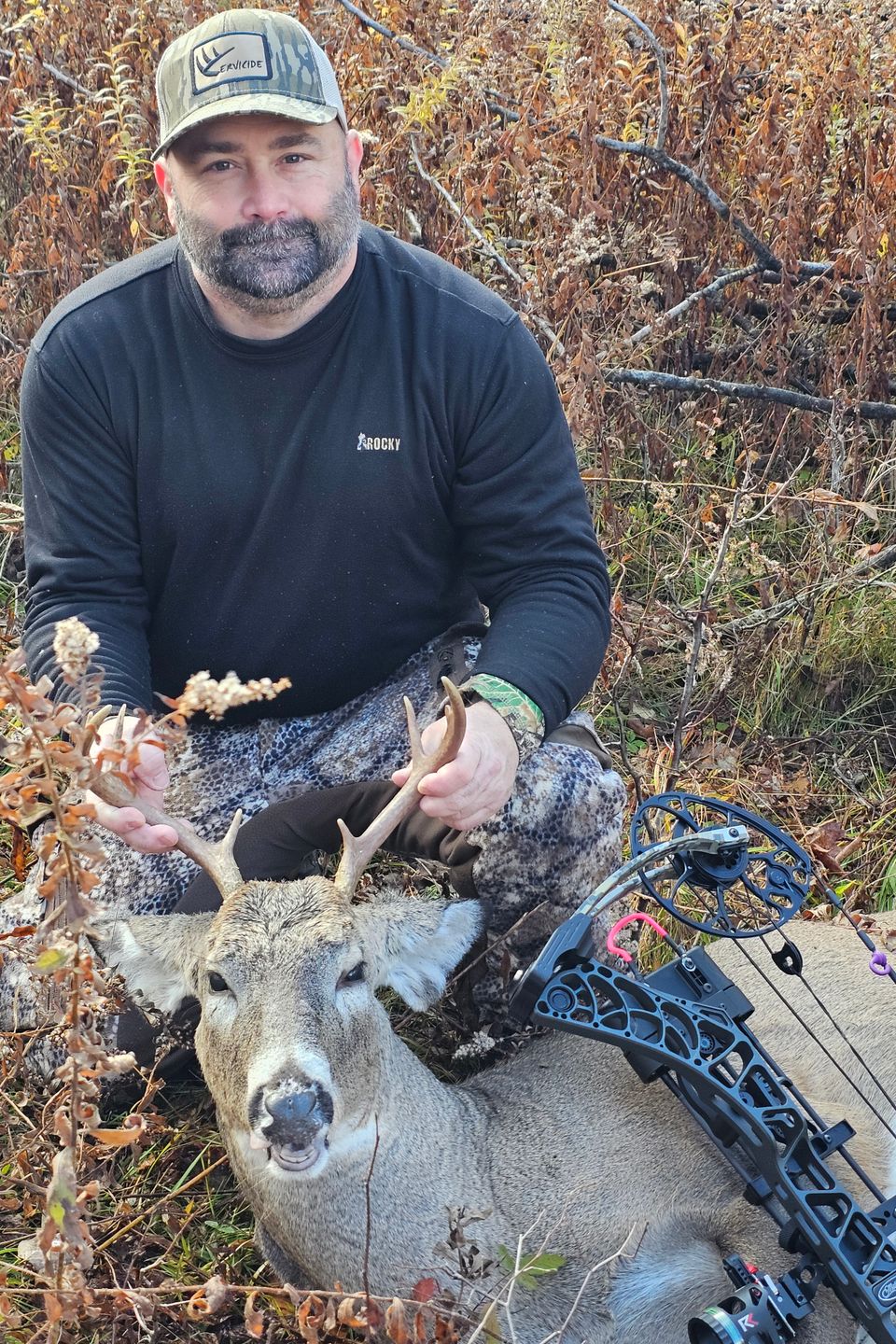 Randall Kreider with the 8-point buck he took with a compound bow in Potter County