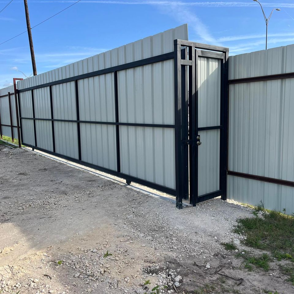 40' * 7' sliding gate with side access door - finished the Marquez Way