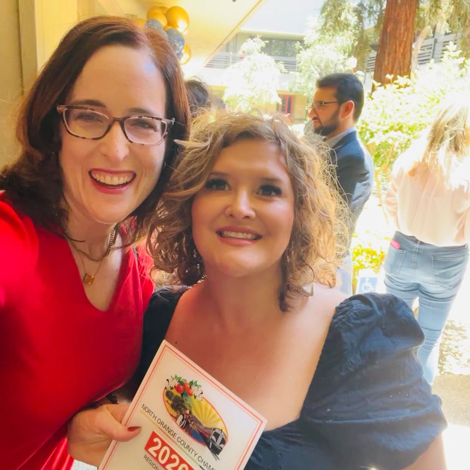 Two women smiling