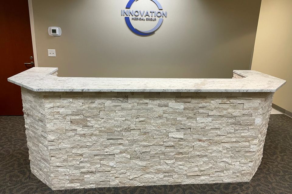 Stone reception desk from front
