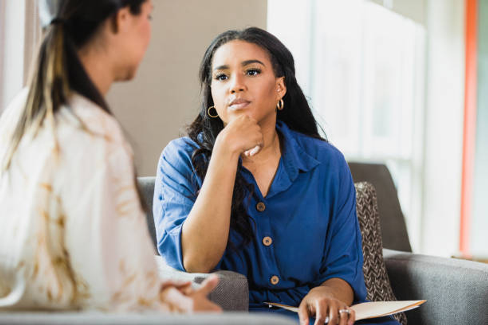 Woman receiving professional consultation support in a one-on-one session