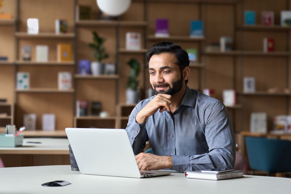 Entreprenuer on computer