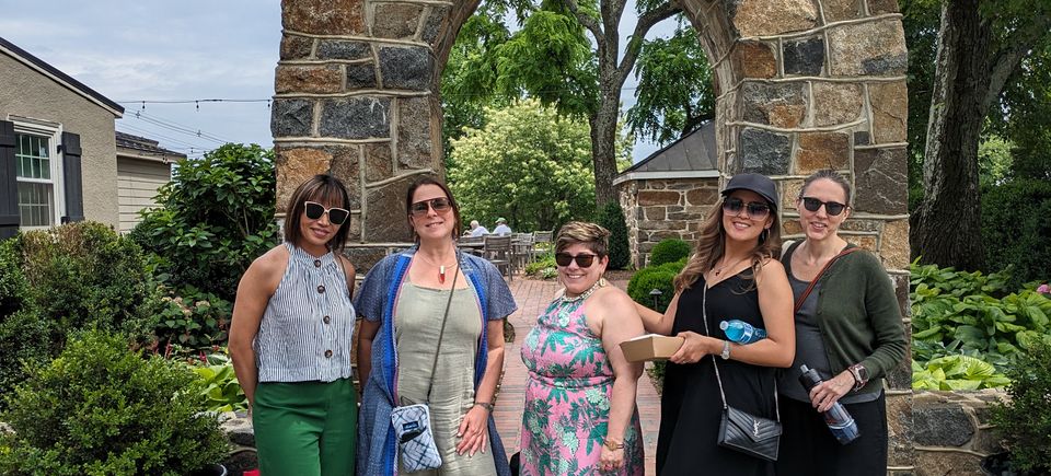 Happy visitors enjoying taking pictures in the vineyard