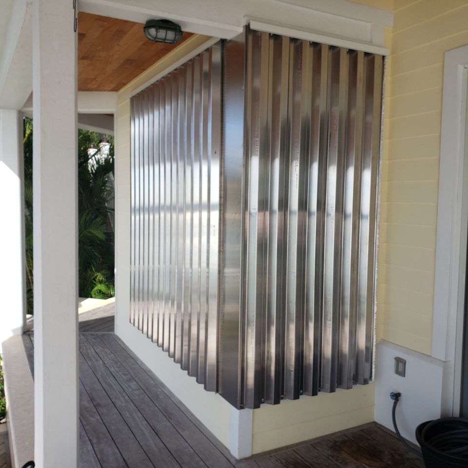 Storm panel on butt glass opening