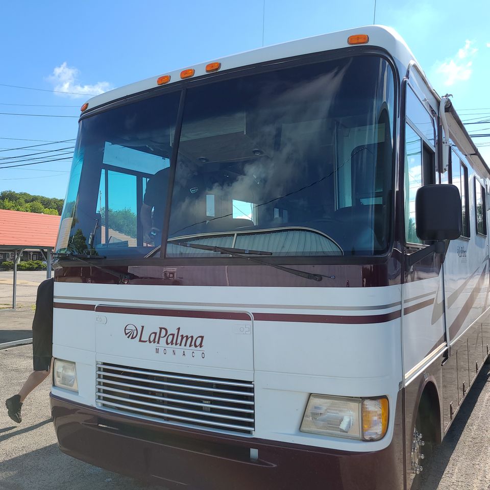 Motorhome with a large front windshield serviced by Repair That Glass.