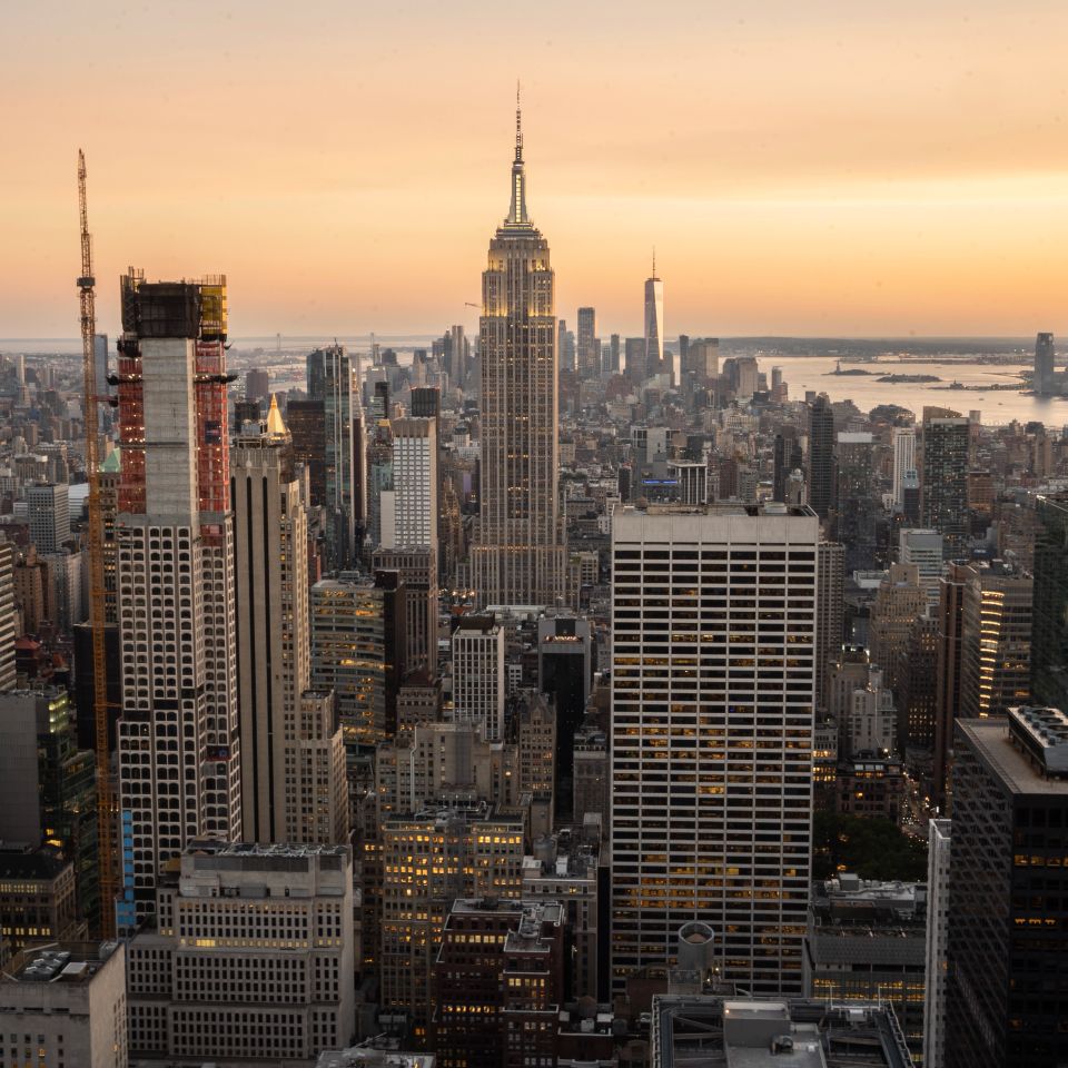 Vistacreate 752943412 stock photo aerial view mid manhattan cityscape seen top rock viewpoint sunset