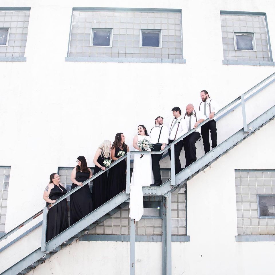 Wedding party on outside staircase