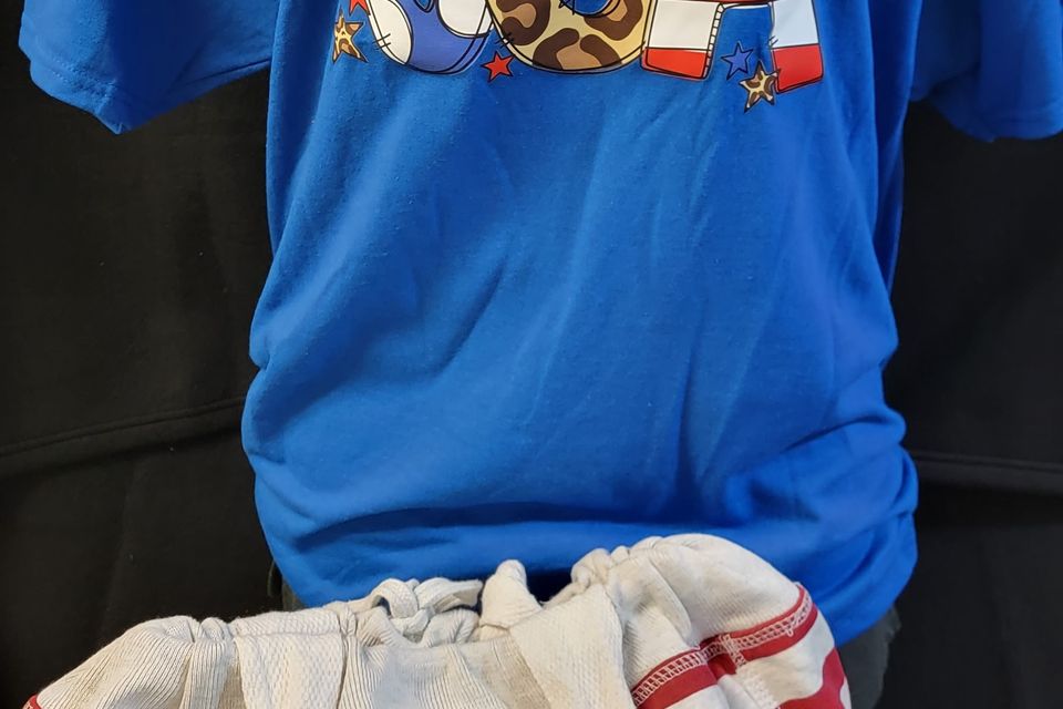 "DTF Direct-to-Film" example - "God Bless the USA" on blue t-shirt