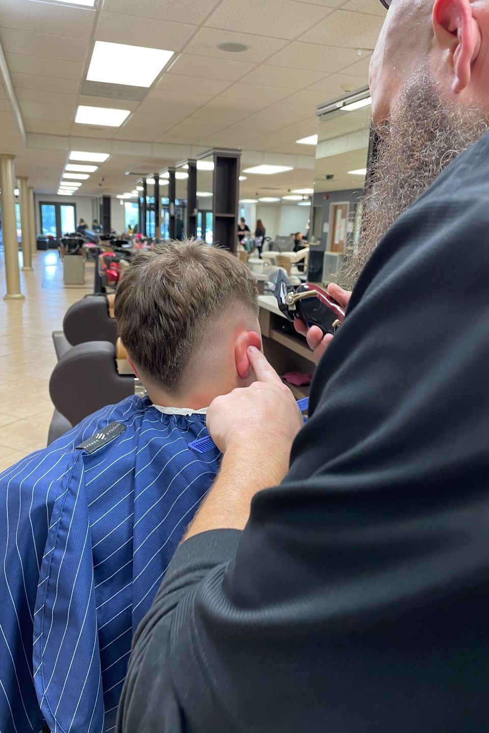 Cosmetology student practicing