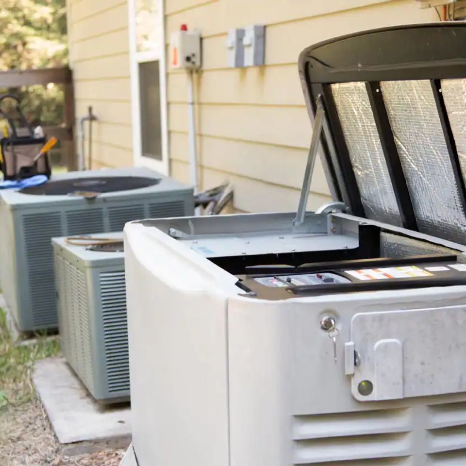 Technician services outside generator 