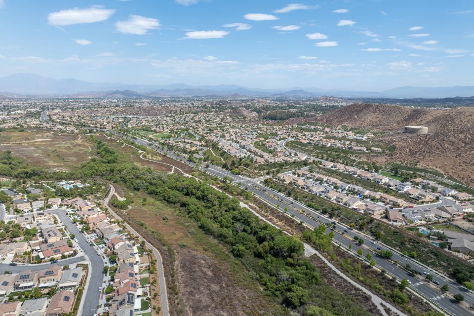 Aerial view of a sprawling neighborhood of family homes in Menifee city in Riverside County, California