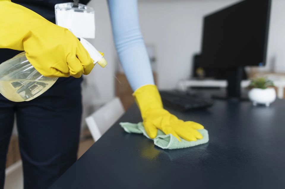 crew cleaning desk