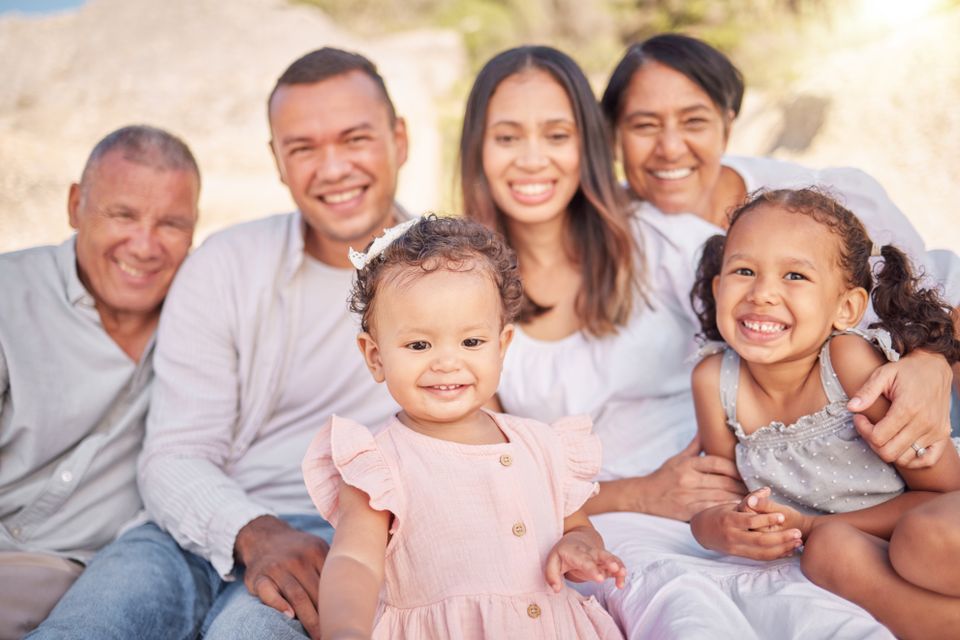 Portrait of a smiling mixed race family with littl 2024 08 15 02 56 17 utc