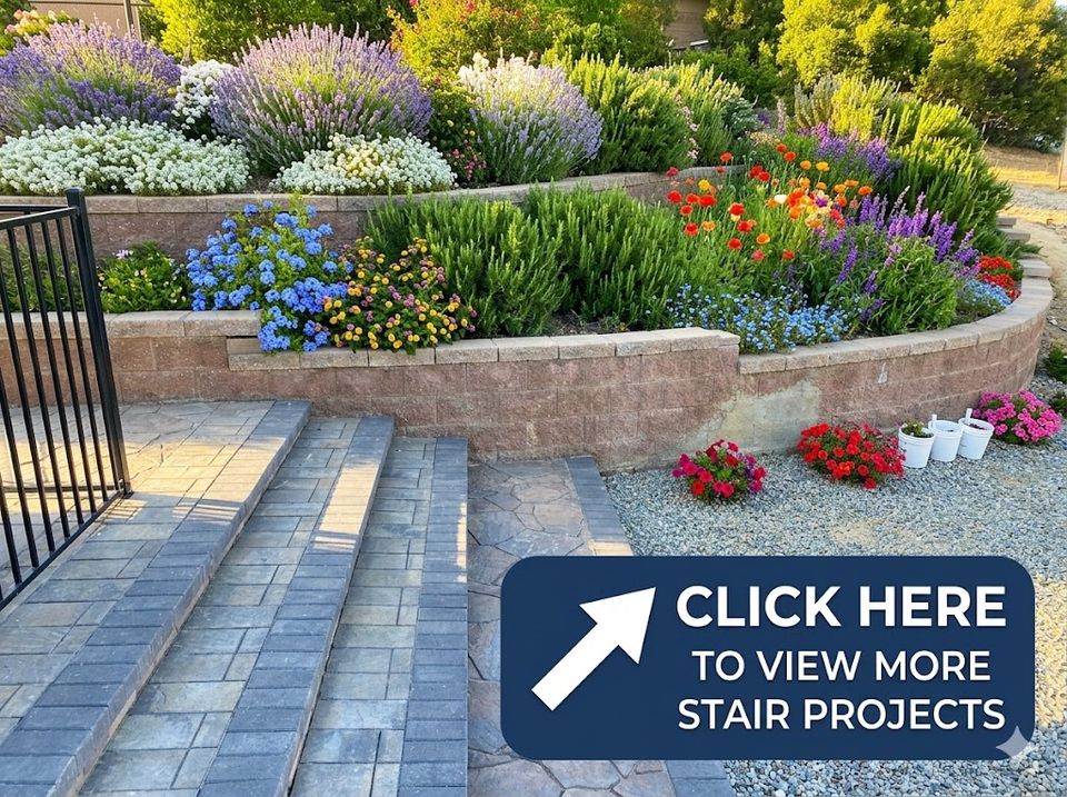 Decorative concrete stairs and paver walkway project with landscaped retaining wall and colorful garden design.