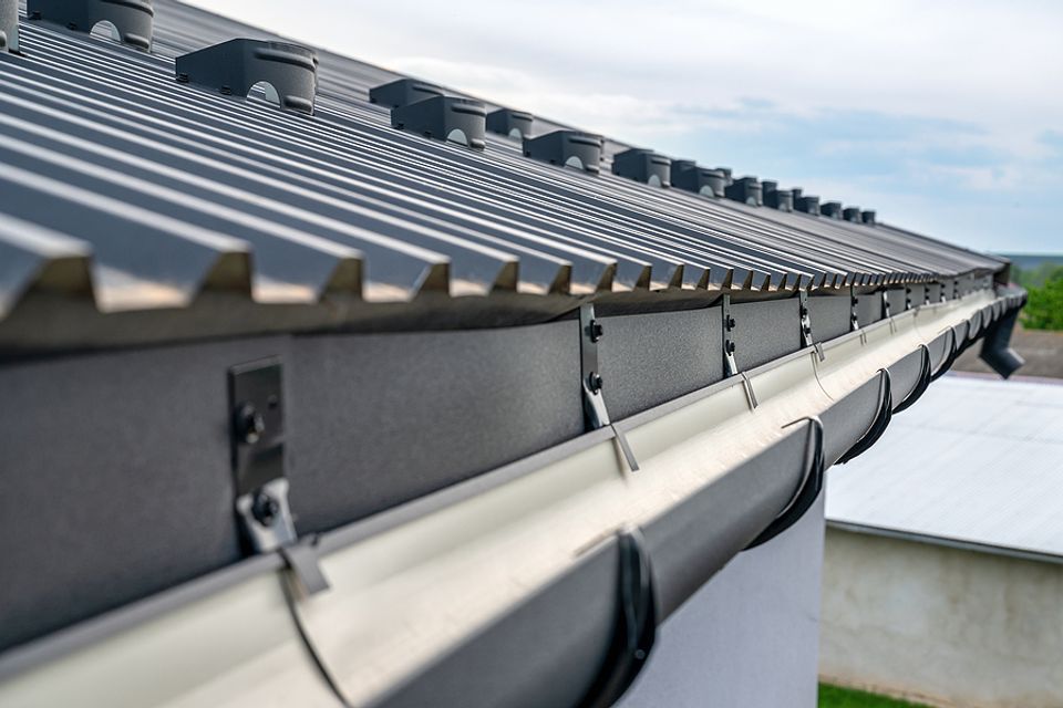 Bigstock  gutter system for a metal ro 381546743